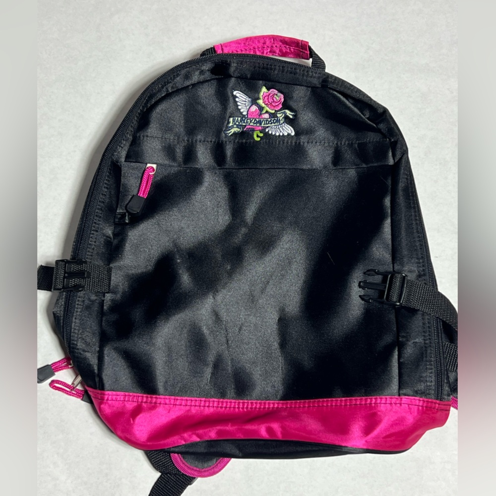 Small black and pink Harley Davidson backpack.